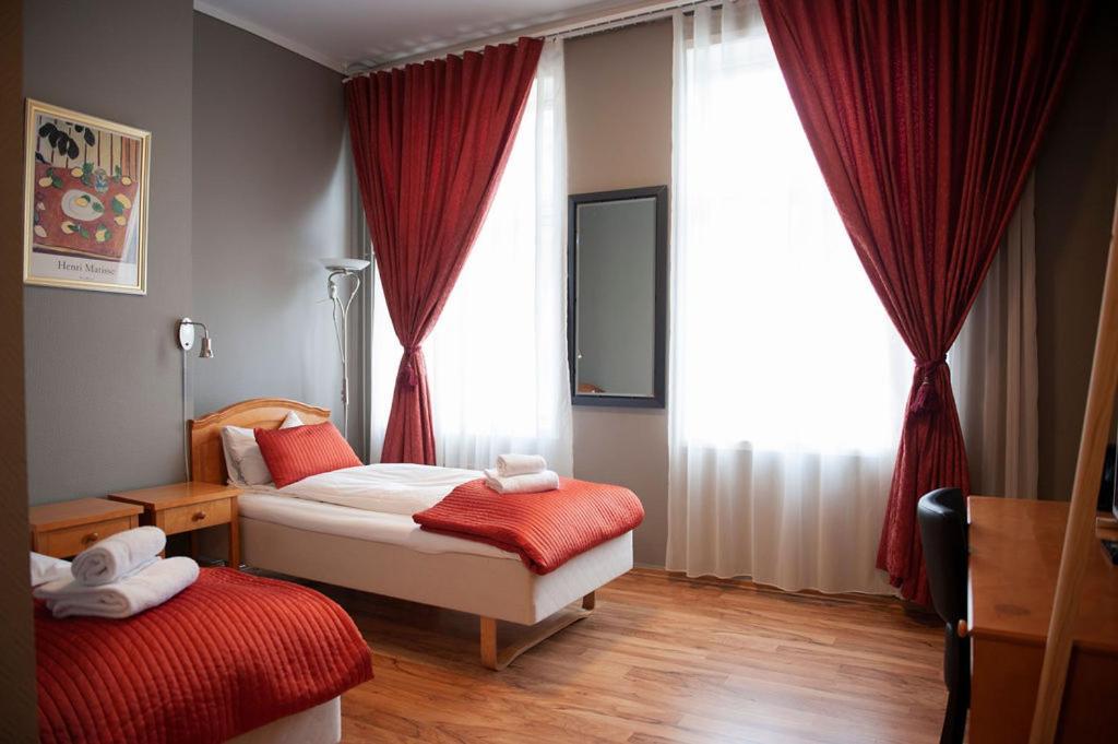 Henriks Hotell Skien Ruang foto
